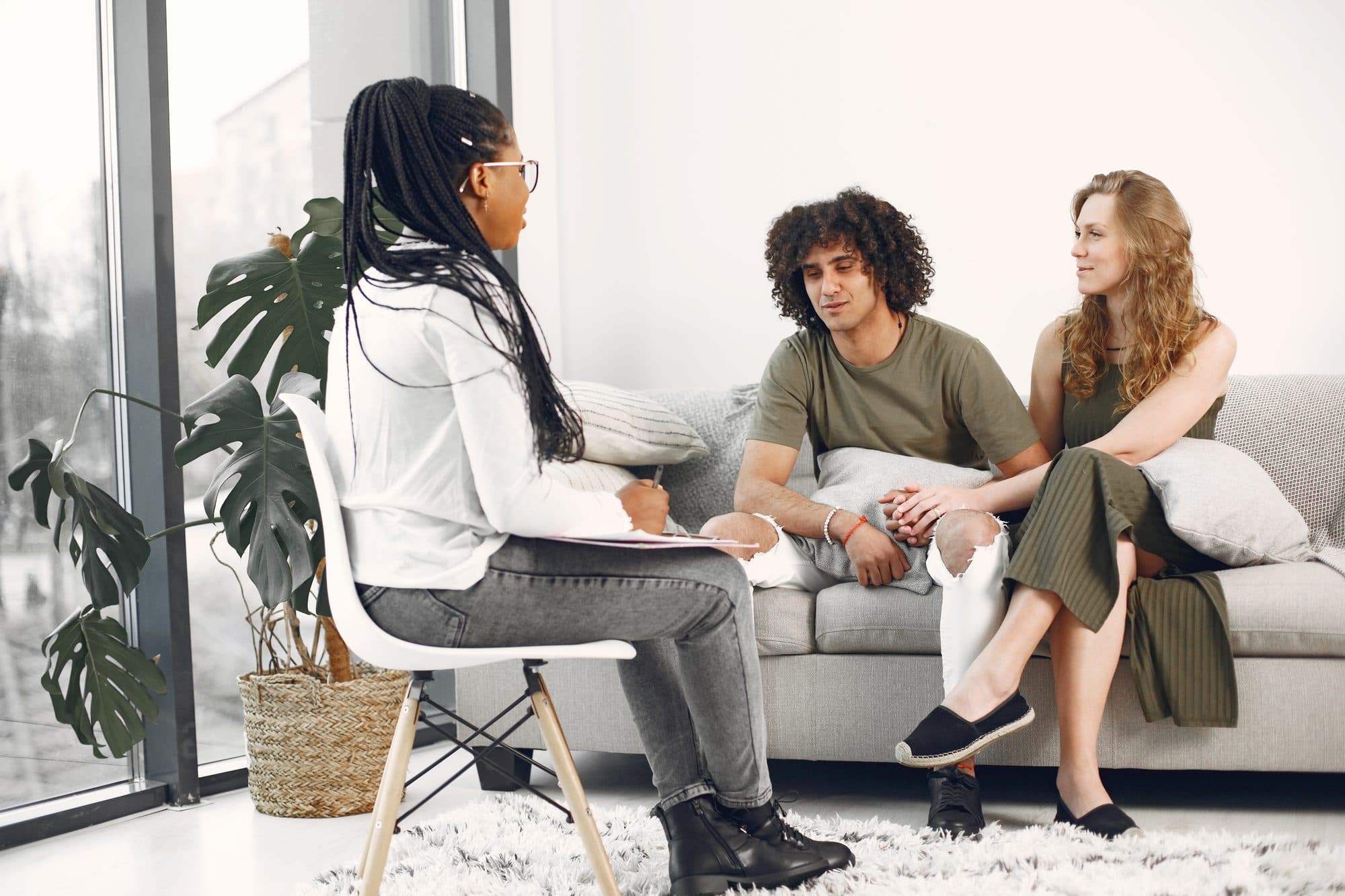A psychologist talking with a client