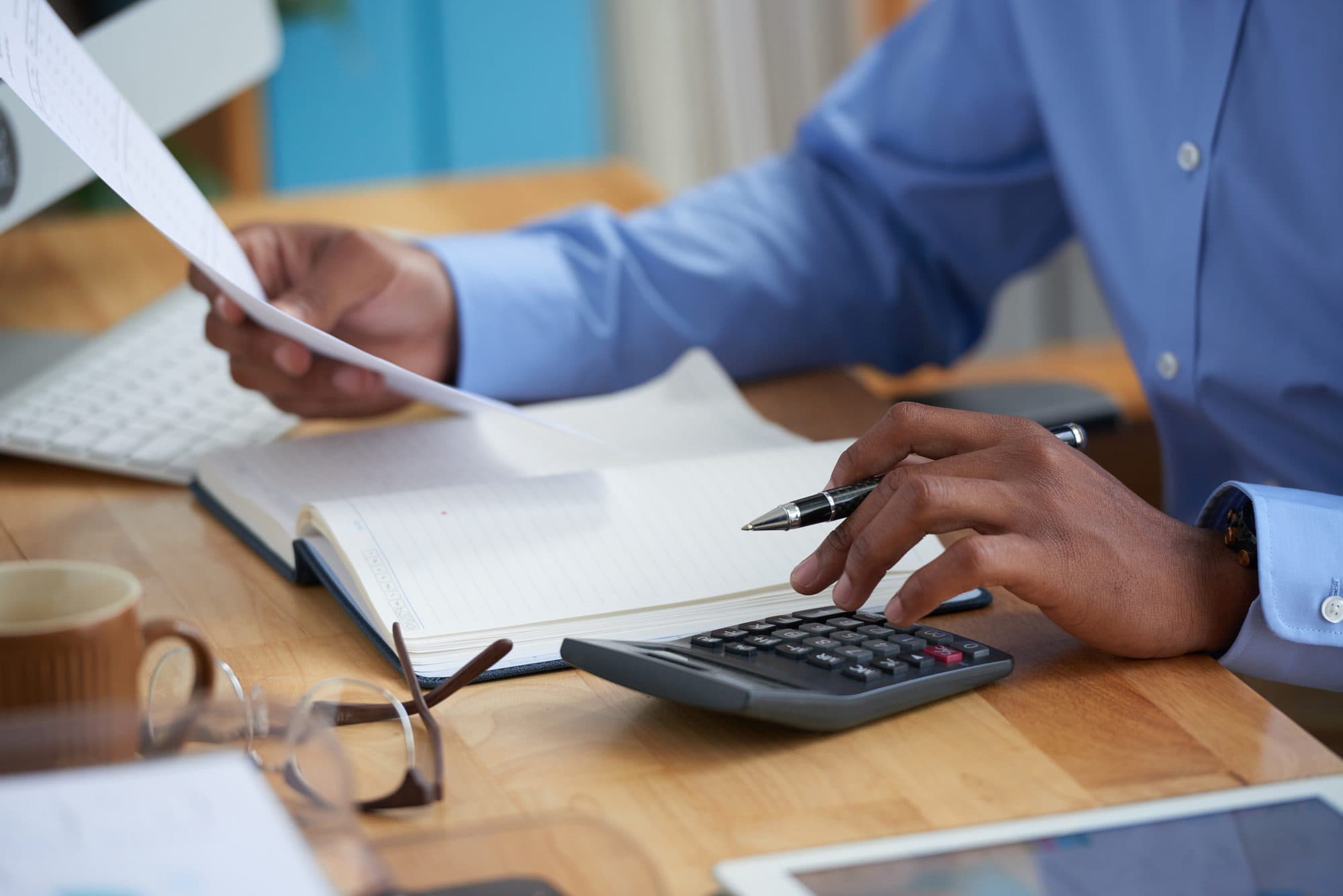 An accountant working with financial documents
